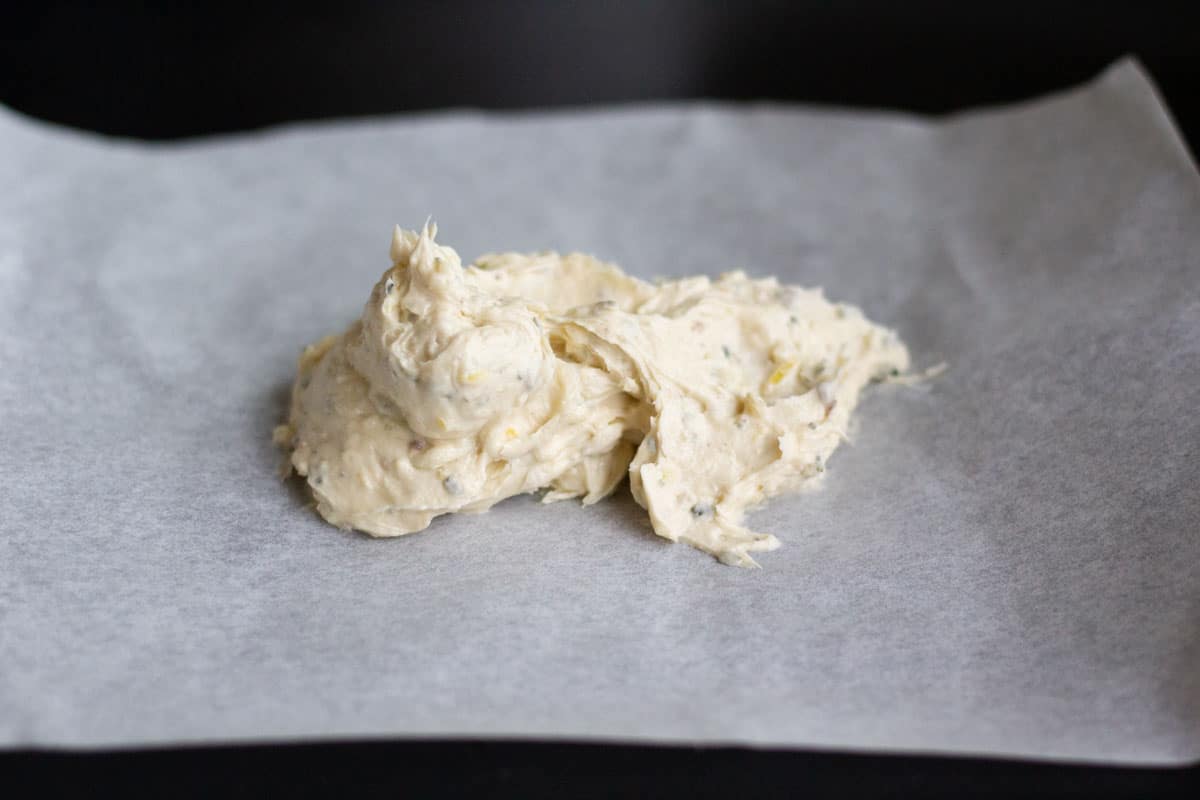 bone marrow butter spread on a sheet of parchment paper
