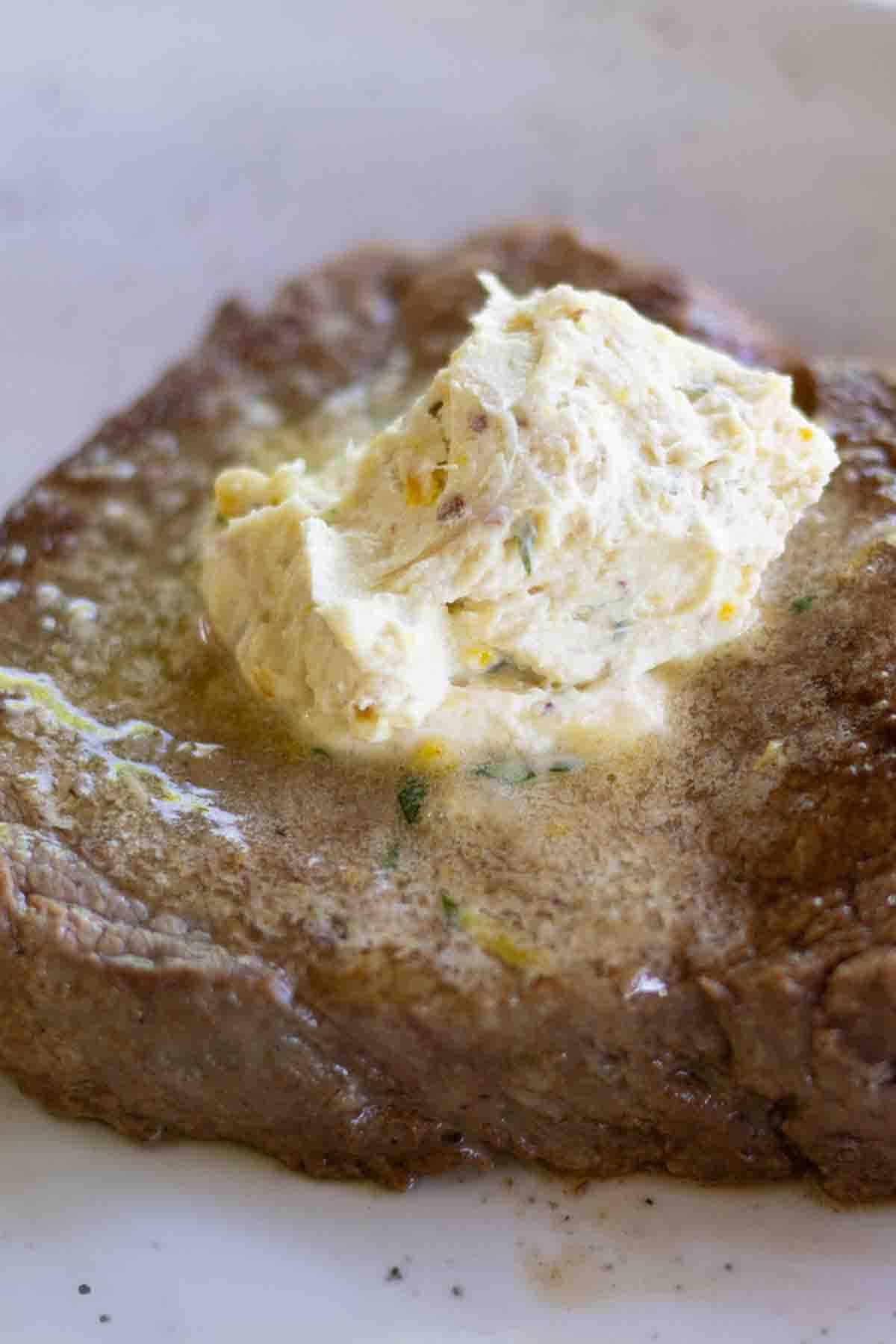 butter of the gods melting on a hot steak