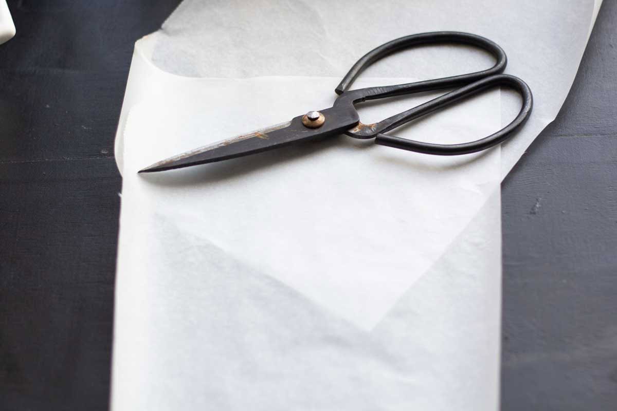 kitchen scissors and parchmetn paper